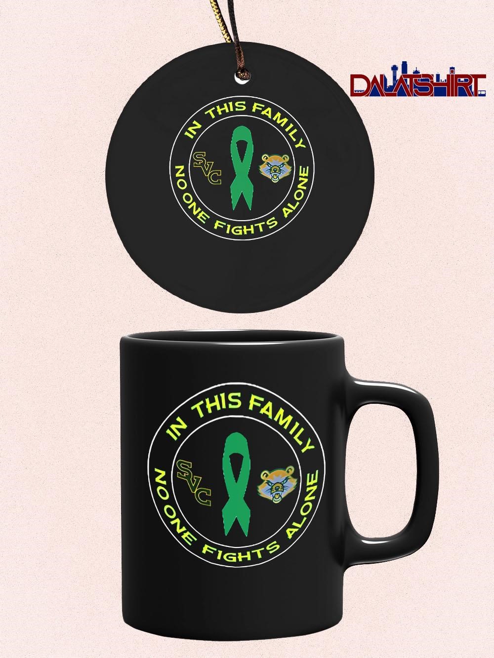 Official In This Family No One Fights Alone logo green mug